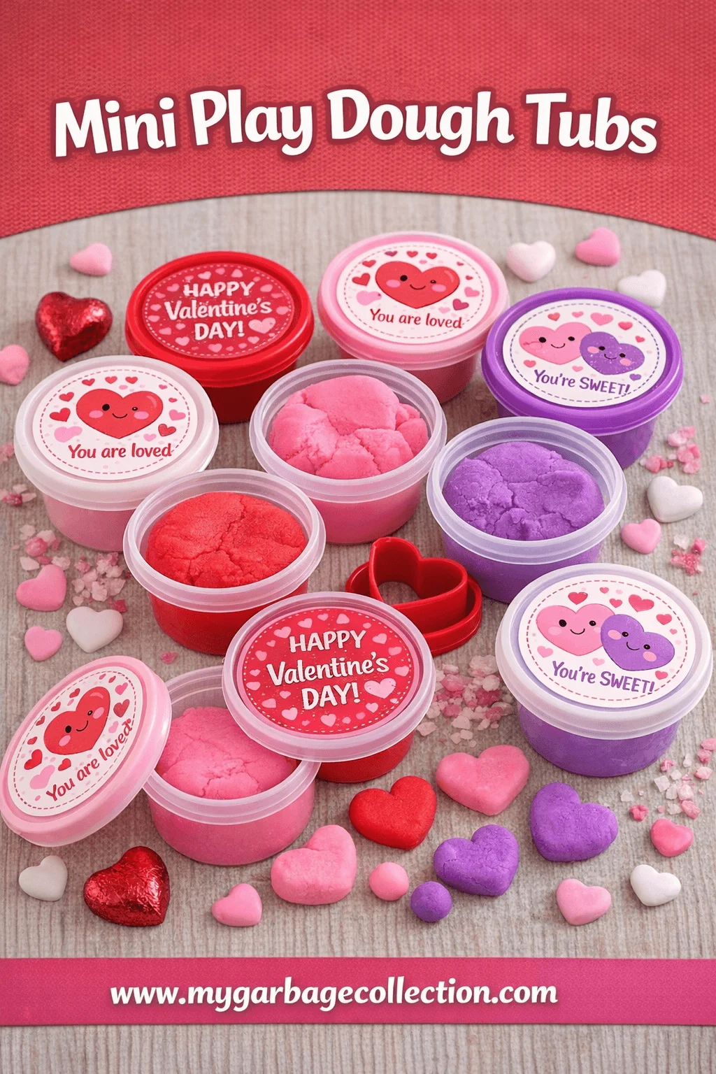 Mini play dough tubs featuring Valentine themed mini containers with pink red and purple play dough heart labels and cute classroom friendly sensory gifts for kids