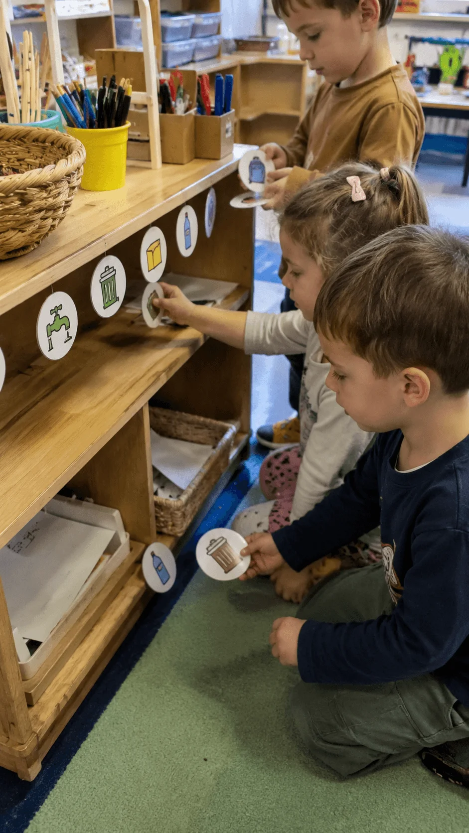 Preschool children using picture symbols to identify classroom waste and suggest eco friendly improvements